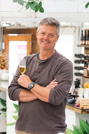 Image of Gordon holding a glass of mead